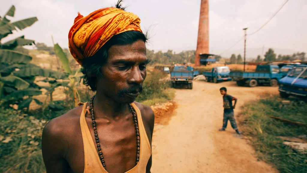 Aerial view of a Class A industrial logistics park at dawn, showing racked warehouses and a loading-dock detail.